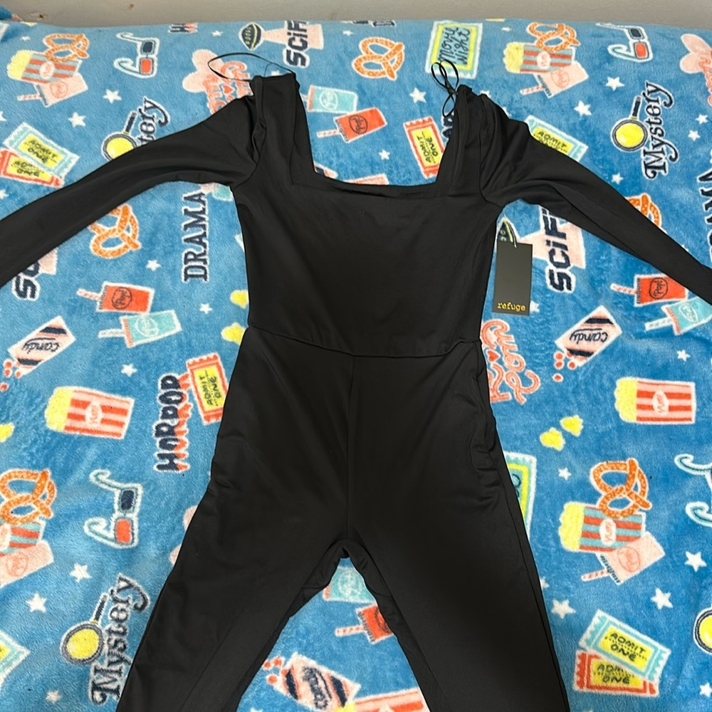 The brand is refuge and it’s black color jumpsuit